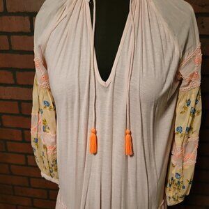 Free People pink dress with mixed material beaded/embroidered sleeves.